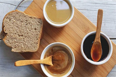 نان جو با ارده و شیره انگور